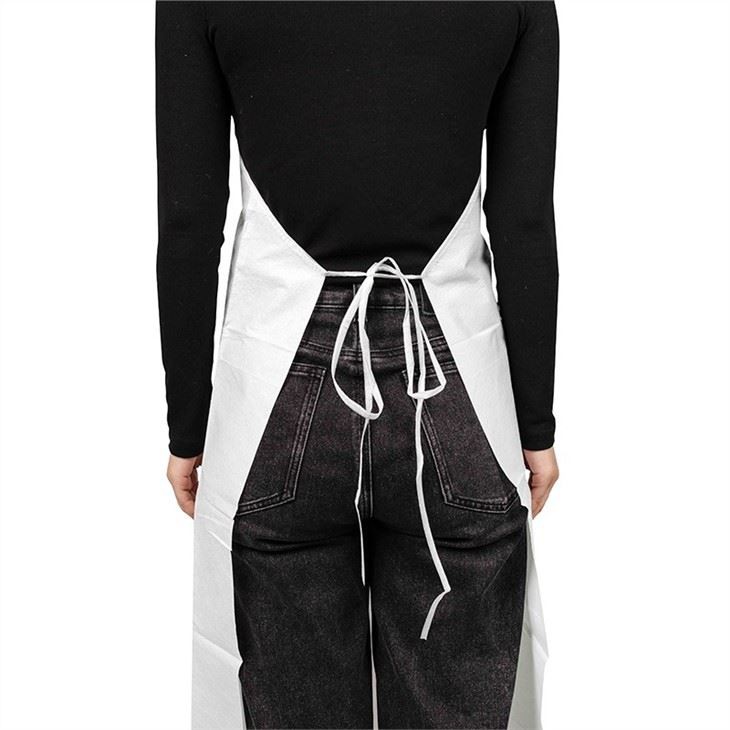 white dispsoable aprons 4
